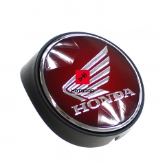 Emblemat logo baku Honda CB 1000 lewy [OEM: 64310MKJD00]