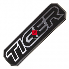 Emblemat stelaża szyby Triumph Tiger 800 2018-2020 [OEM: T2308860]