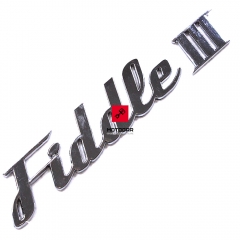 Logo SYM Fiddle III emblemat [OEM: 87128-XGA-000]
